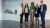 Five members of Air BP male and female standing in front of display panel