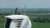 Onshore wind enegineers on top of turbine