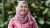 Young woman wearing head scarf
