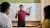 Man pointing at whiteboard in a meeting