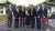Ribbon cutting line up from left to right: Alexander Walsh, Senior Managing Director at Blackstone; Paul Thandi, CEO, NEC Group; Reza Shaybani, CEO, E...