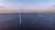 An image of wind farms at sea