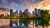 Sunset above city skyline of Calgary with Bow River, Alberta, Canada, photographed from Prince's Island Park