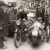 Crowds gather around a motorcycle as it is filled with Castrol lubricant, on its record-breaking drive from Vienna to Ostend in 1934