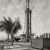 Low-angled shot of a drilling derrick next to a small palm tree at the Cusiana oil field in Colombia, 1994