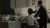 Historisches Bild: Zwei Personen vor altem Computer