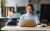 person reviewing fleet portal on laptop
