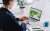 person reviewing fleet portal on laptop
