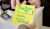 person getting a BPme rewards card