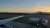 Refuelling a plane at sunset