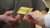 Hand passing over a BP Gift Card