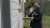 A bp employee paints a Houston home