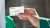Hand holding a bp Amoco gift card